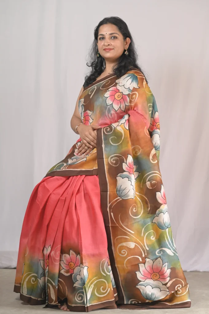 hand painted floral bishnupuri silk saree in coral pink & earthy tones | pure silk mark certified